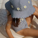 Sybille Swimsuit mit Gänseblümchen aus recyceltem Polyester GRS von Konges Slojd kaufen - Kleidung, Babykleidung & mehr