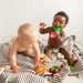 Babyspielzeug “Ramona the Radish” von Oli&Carol kaufen - Baby, Alltagshelfer, Geschenke, Babykleidung & mehr